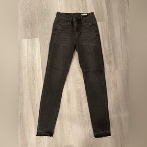 BLANKNYC 'The Bond Mid-Rise Skinny' in washed black. Unfinished bottom. Size 25